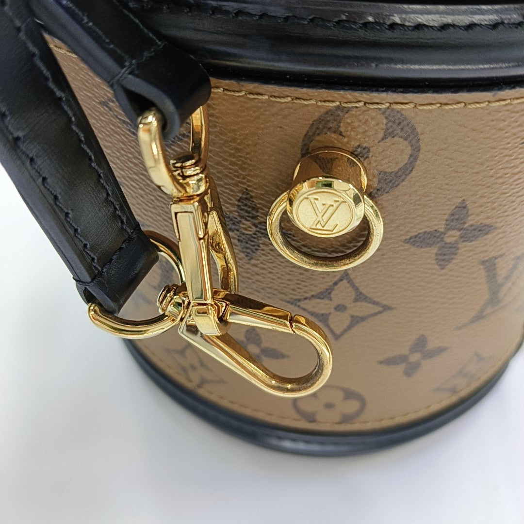 CANNES PM Monogram Coated Canvas Brown
