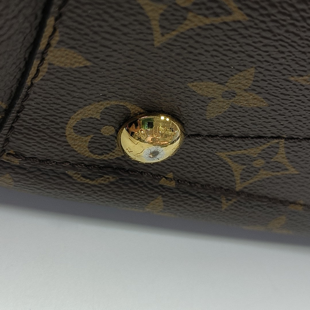 MONTAIGNE Monogram Coated Canvas Brown