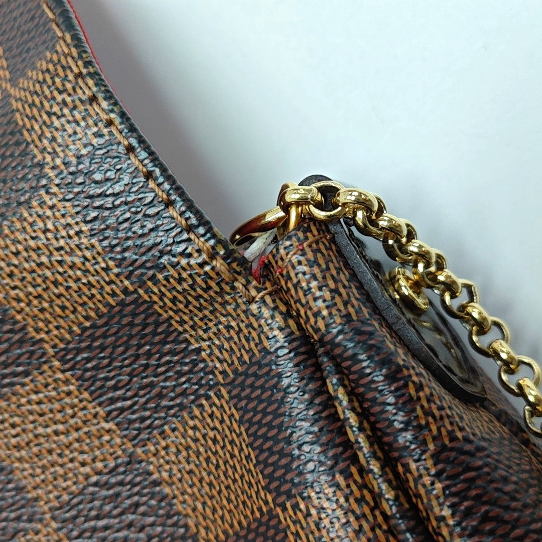 FAVORITE PM Damier Ebene Coated Canvas Brown