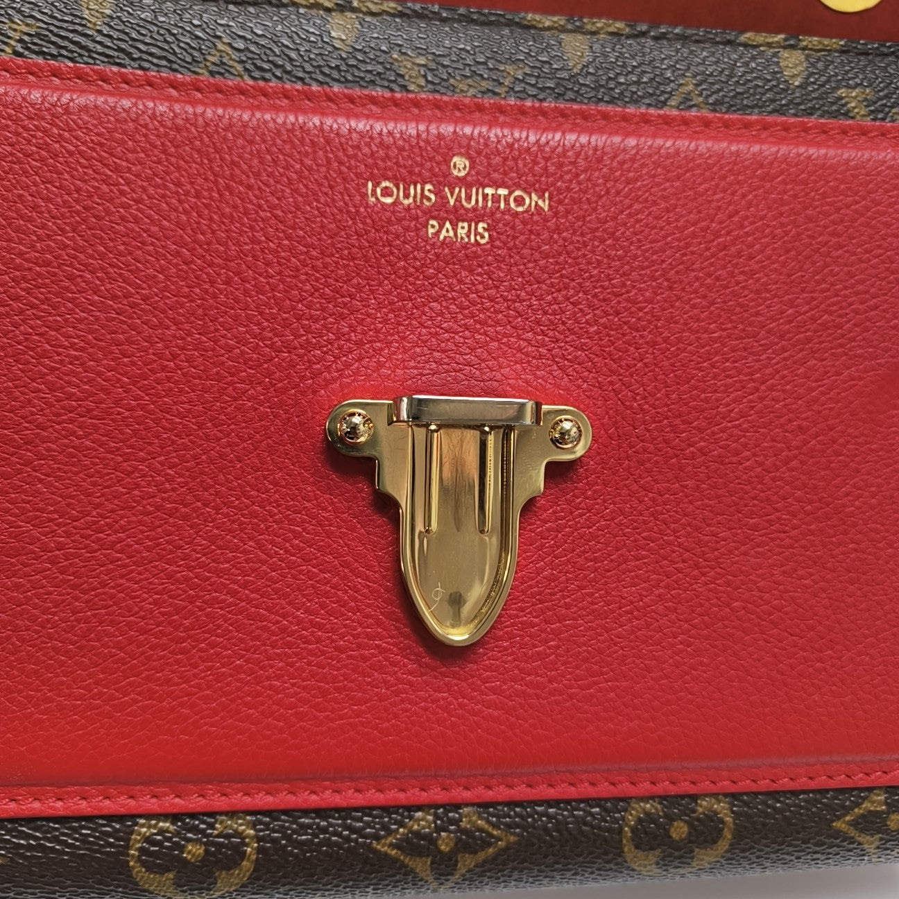 VICTOIRE Monogram Coated Canvas Brown