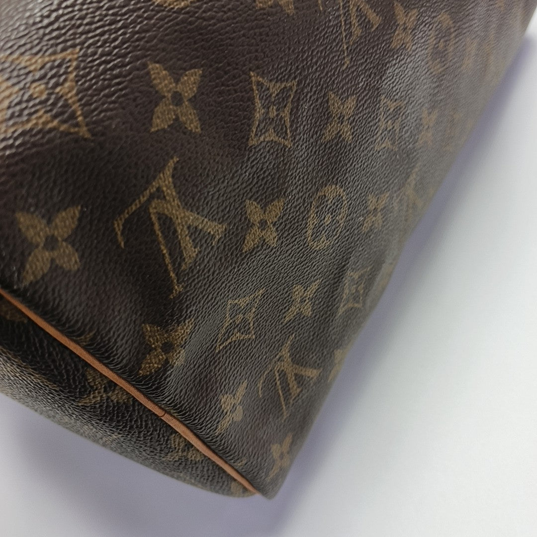 SPEEDY 30 Monogram Coated Canvas Brown