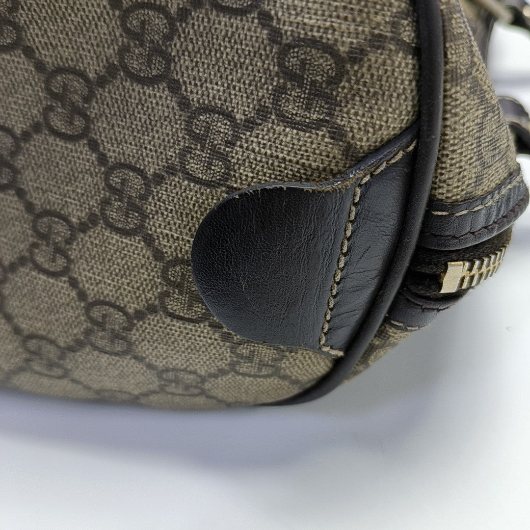 Monogram Coated Canvas Top Handle Bag Brown