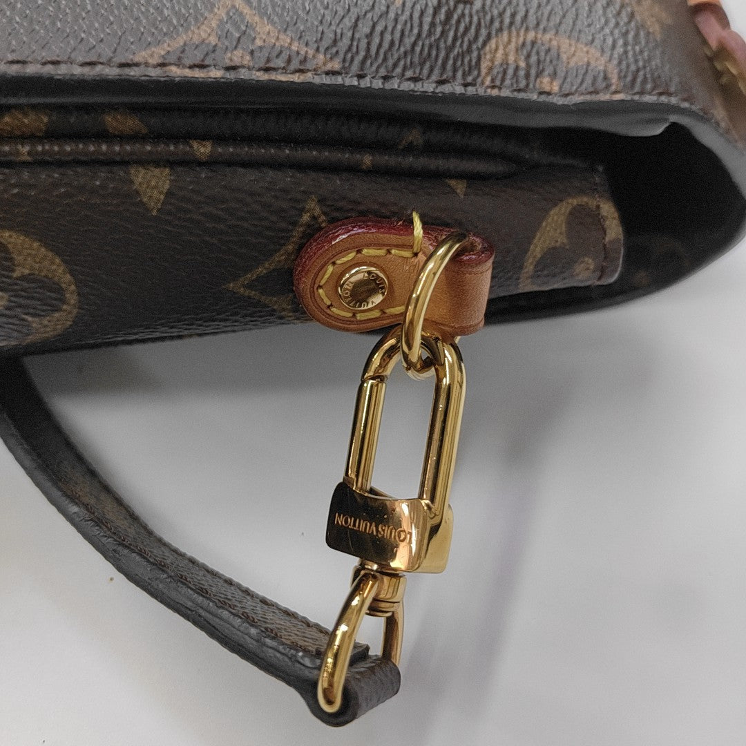 MÉTIS MM Monogram Coated Canvas Brown