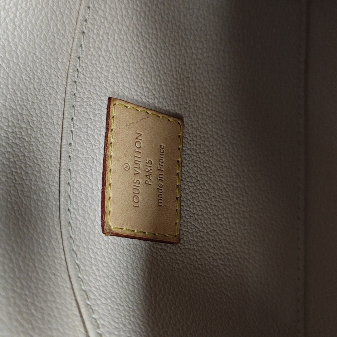 COSMETIC Monogram Coated Canvas Brown