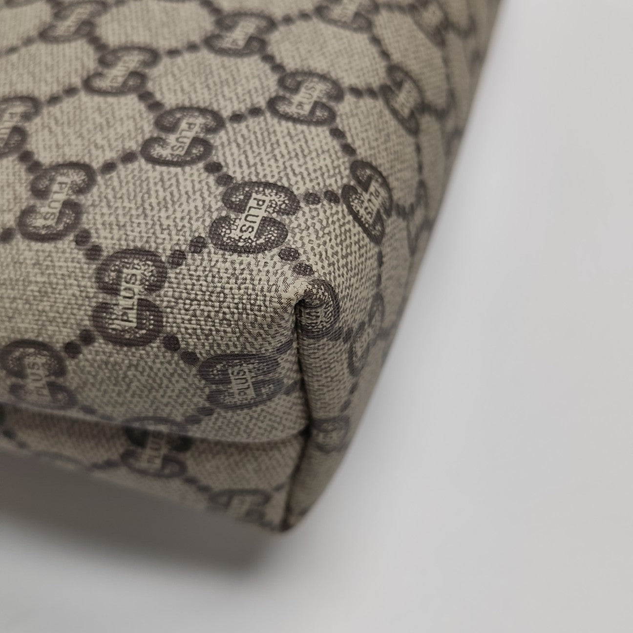 Monogram Coated Canvas Clutch Beige