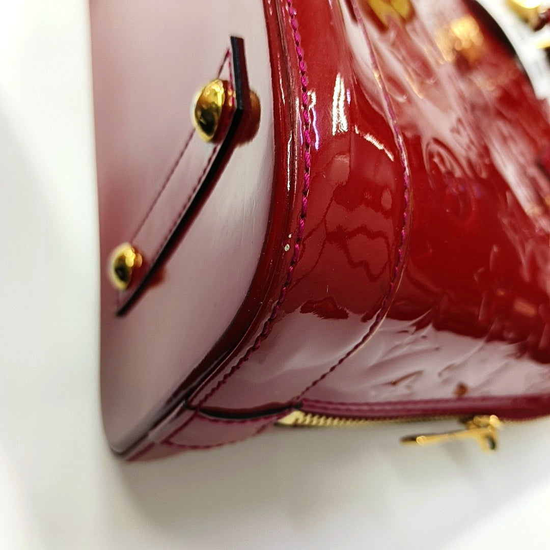 ALMA PM Monogram Patent Leather Red