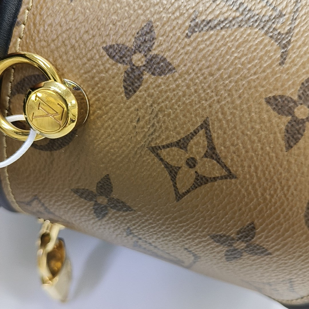 CANNES PM Monogram Coated Canvas Brown