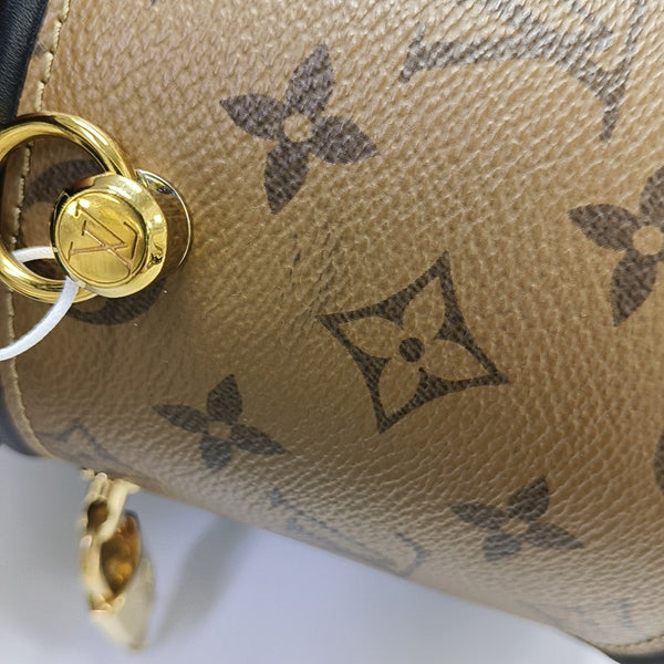 CANNES PM Monogram Coated Canvas Brown