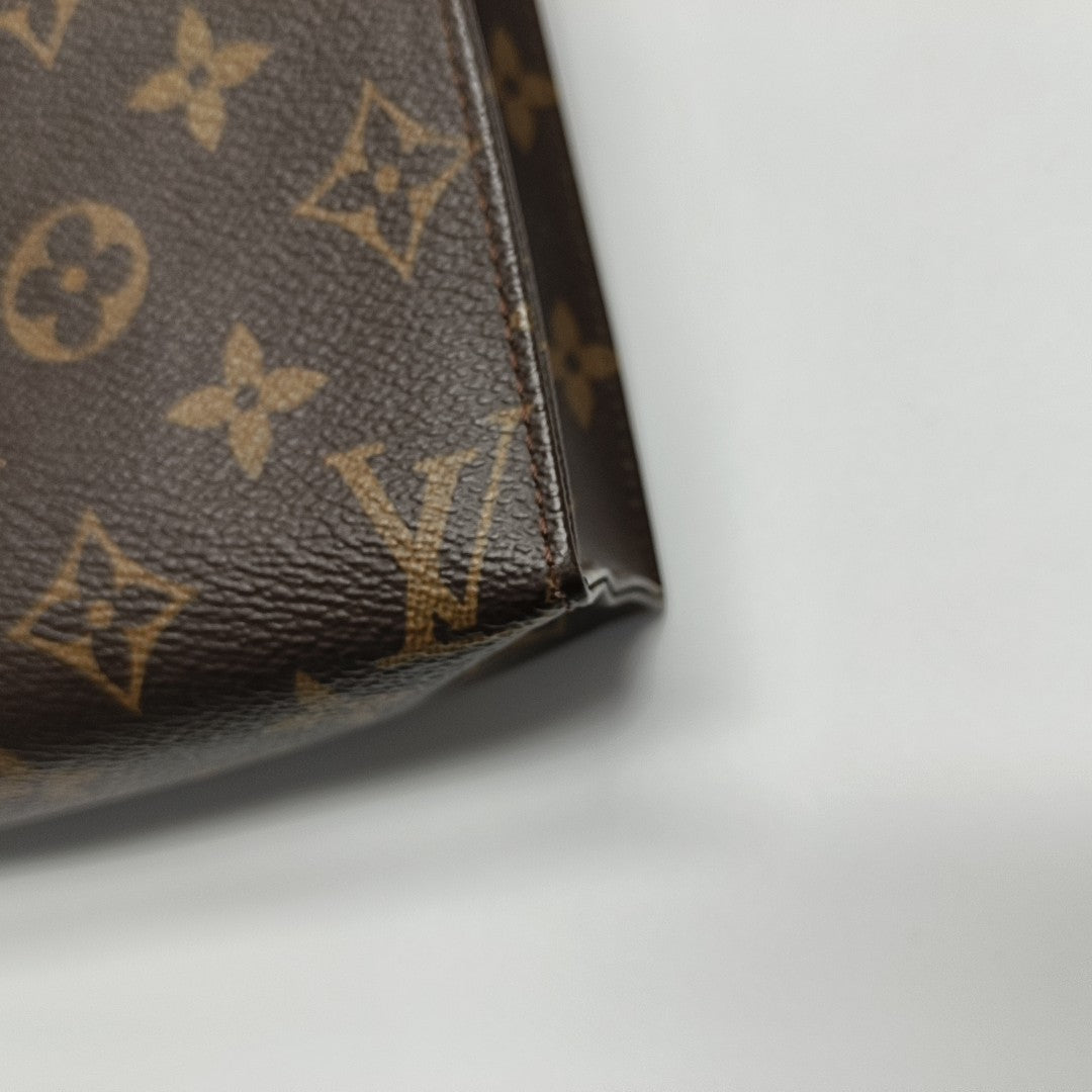 TOILET POCKET 19 Monogram Coated Canvas Brown