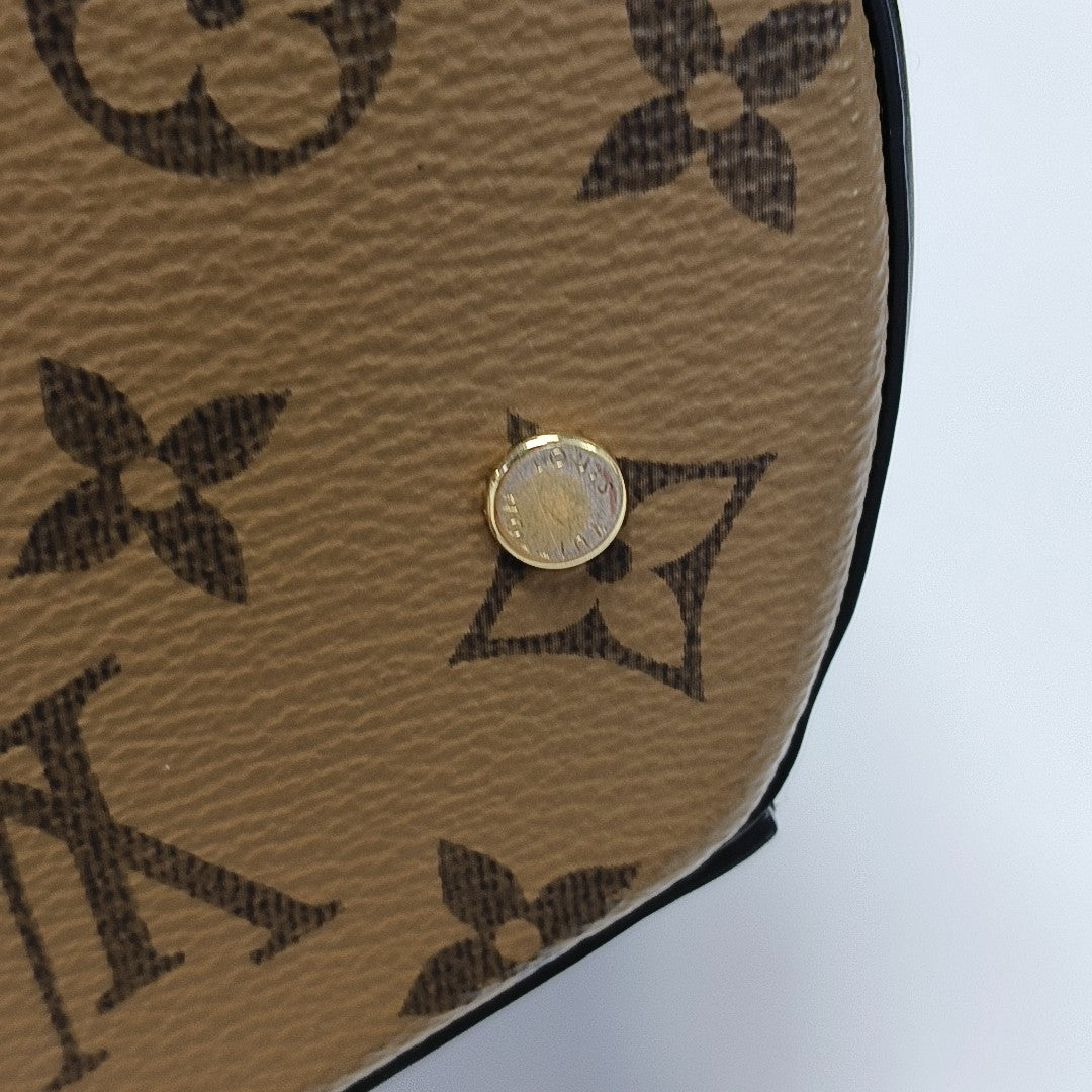 CANNES PM Monogram Coated Canvas Brown
