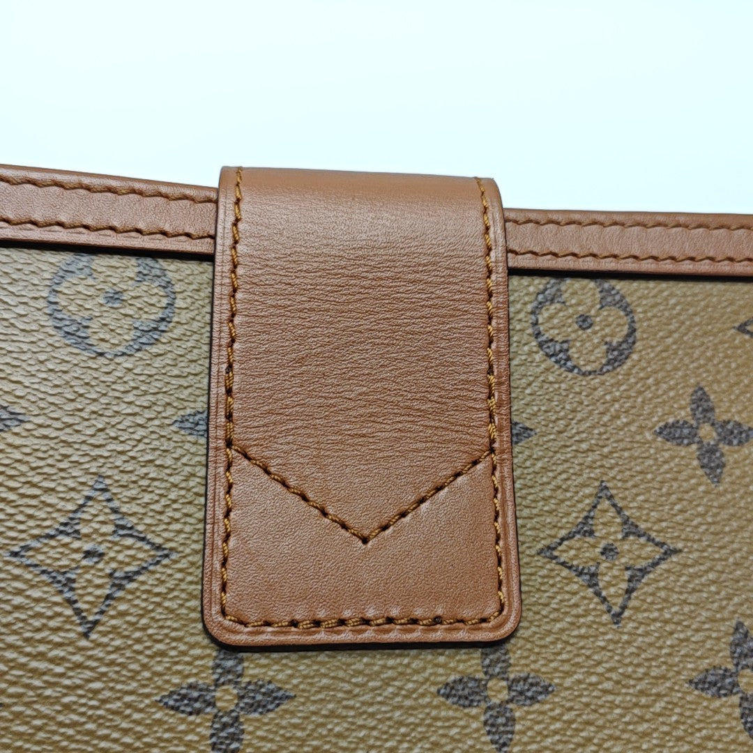 DAUPHINE Monogram Coated Canvas Brown
