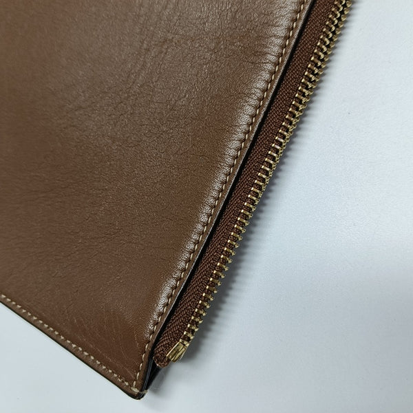 Monogram Coated Canvas Clutch Beige