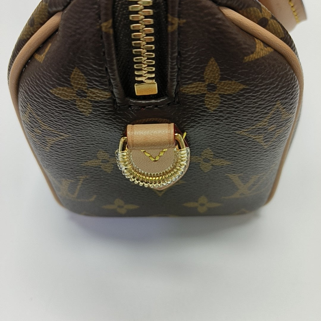 SPEEDY 20 Monogram Coated Canvas Brown