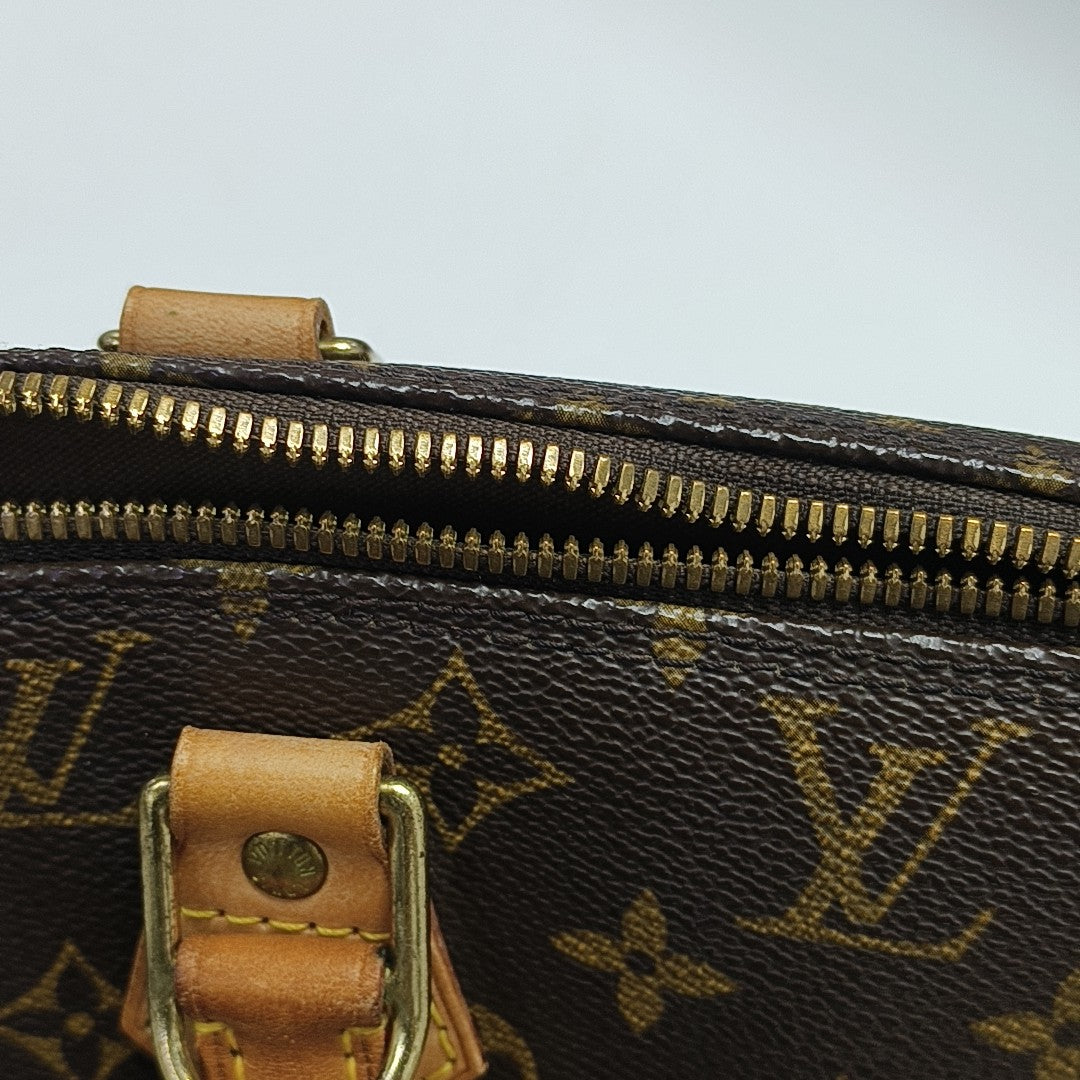 ALMA PM Monogram Coated Canvas Brown