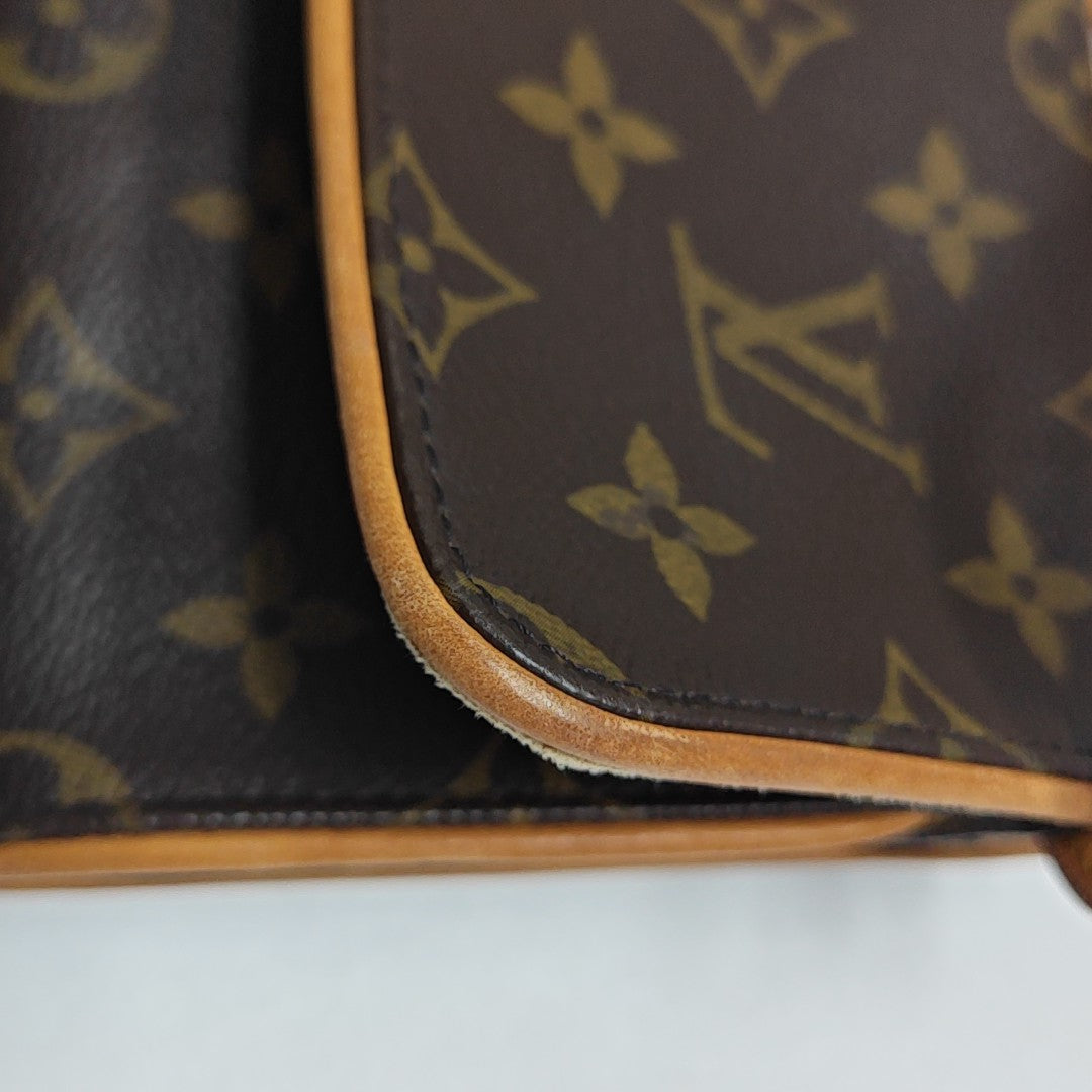 TWIN GM Monogram Coated Canvas Brown