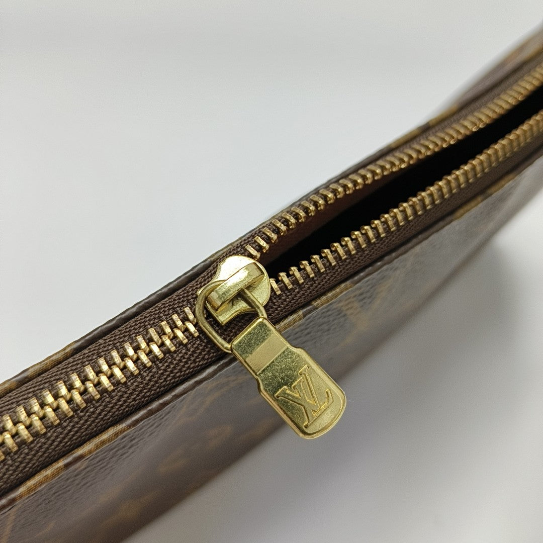 ACCESSOIRES GM Monogram Coated Canvas Brown