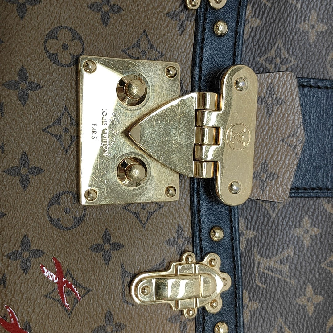 TRUNK Monogram Coated Canvas Brown