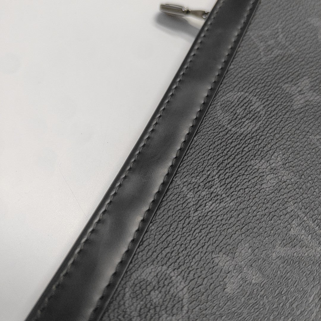 Pochette Voyag MM Monogram Coated Canvas Black