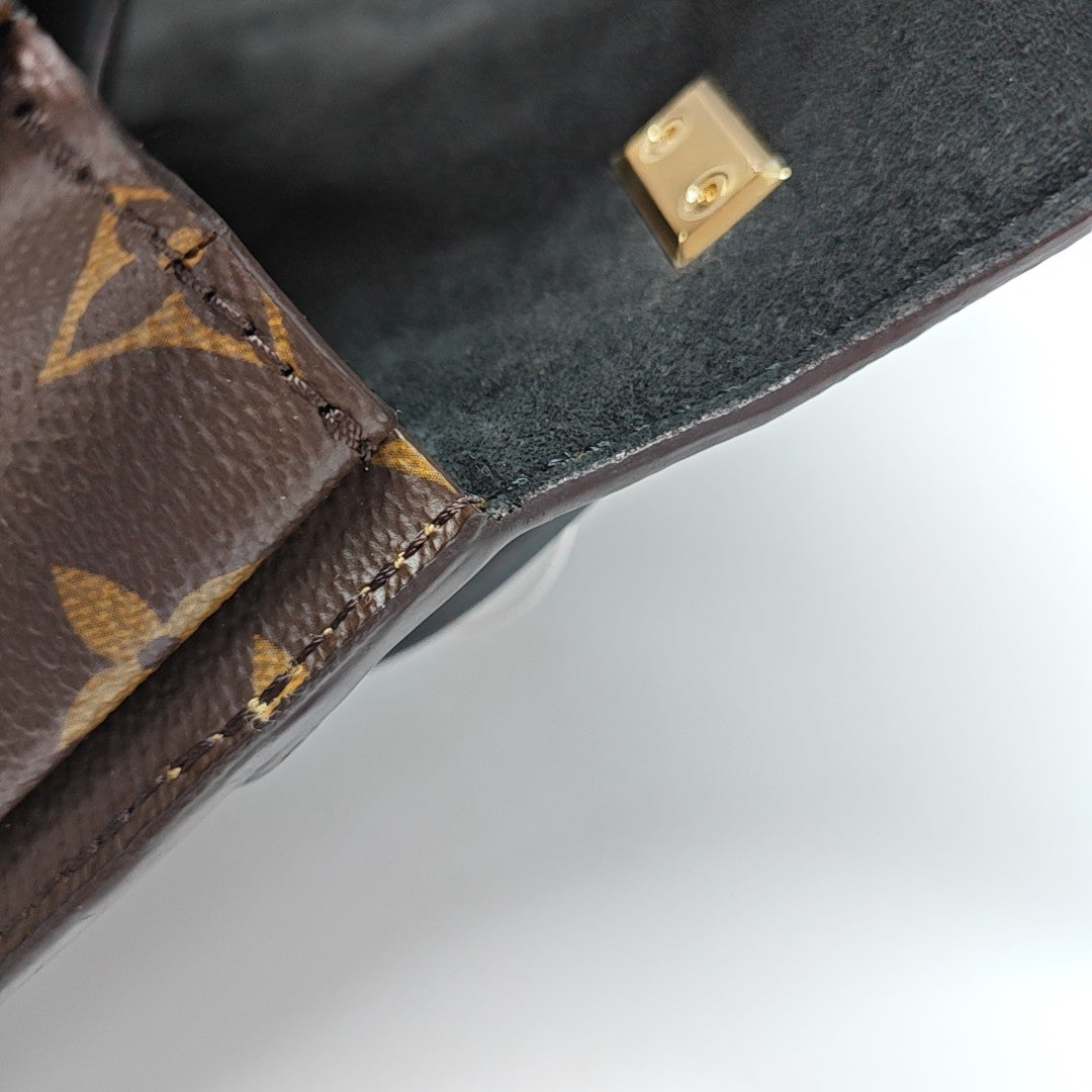 EDEN Monogram Coated Canvas Brown