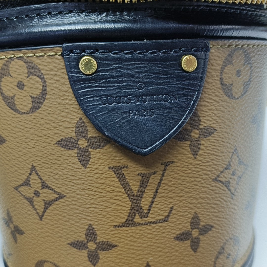 CANNES PM Monogram Coated Canvas Brown
