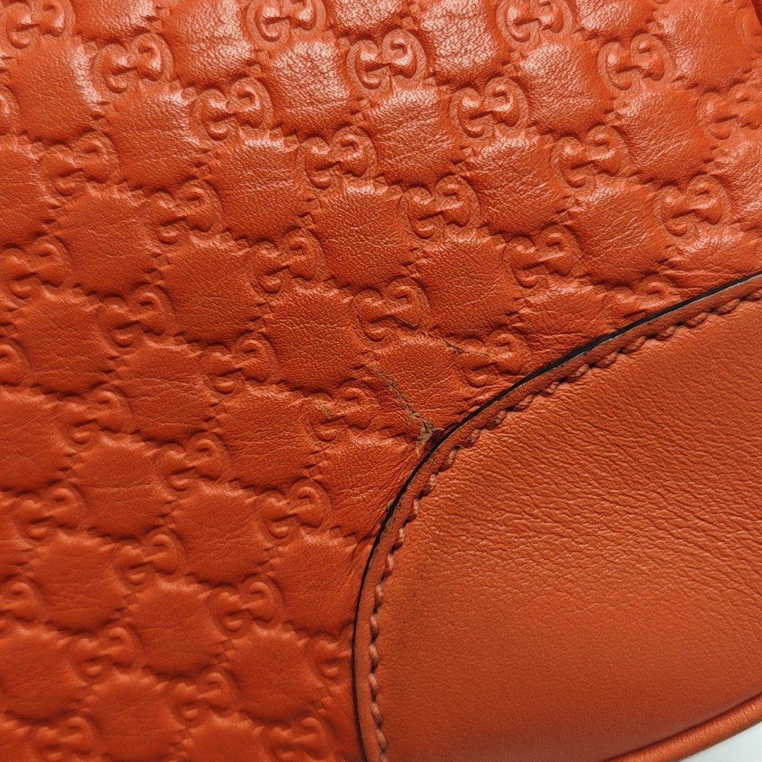 Bree Monogram Calfskin Orange