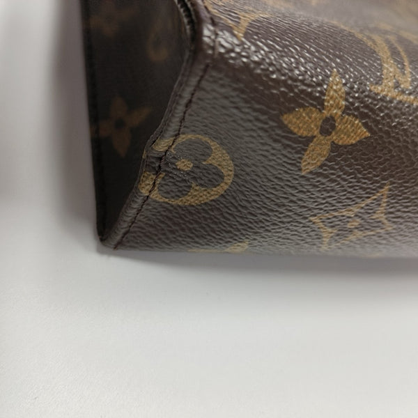 TOILET POCKET 26 Monogram Coated Canvas Brown