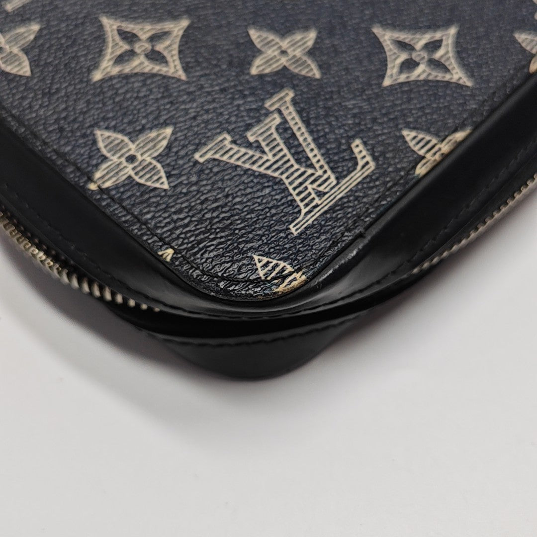 TROUSSE TOILETTE Monogram Coated Canvas Blue