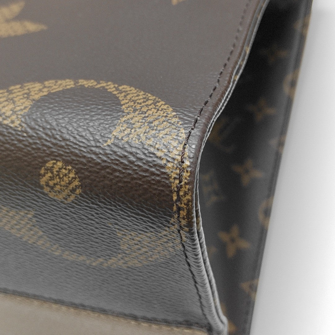 ONTHEGO MM Monogram Coated Canvas Brown