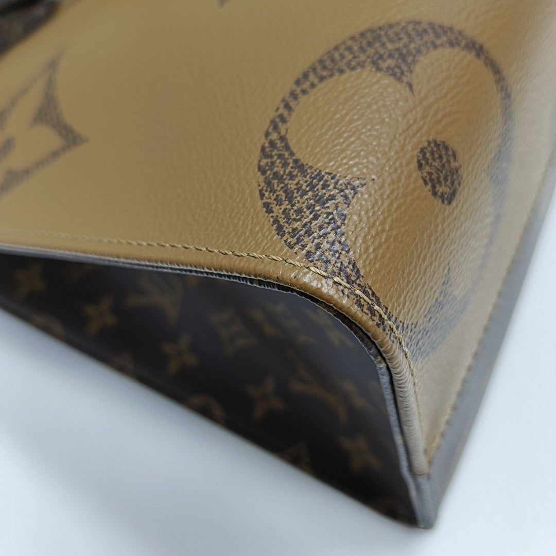 Authenticated pre-owned  ONTHEGO MM Monogram Coated Canvas Brown - Tote Bag at Looply