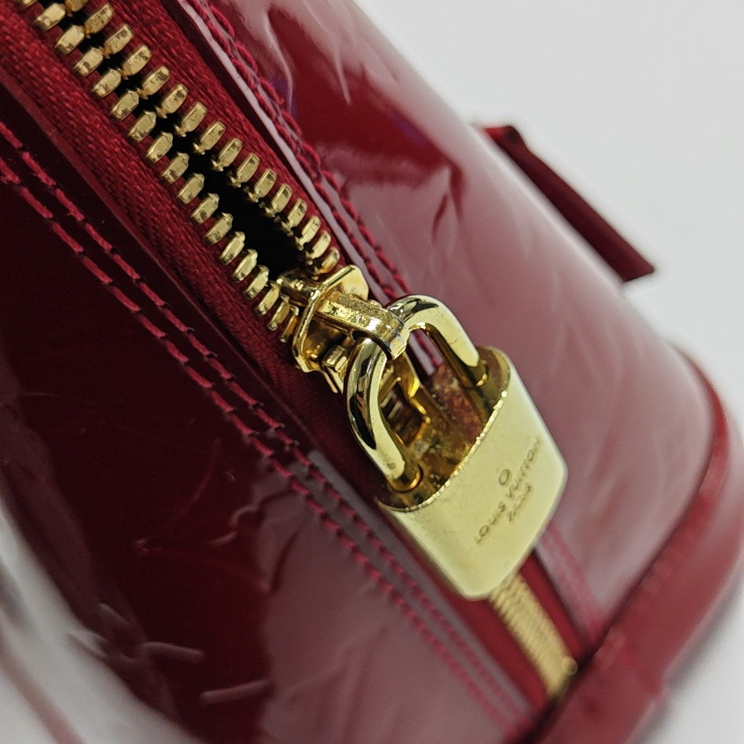ALMA PM Monogram Patent Leather Red