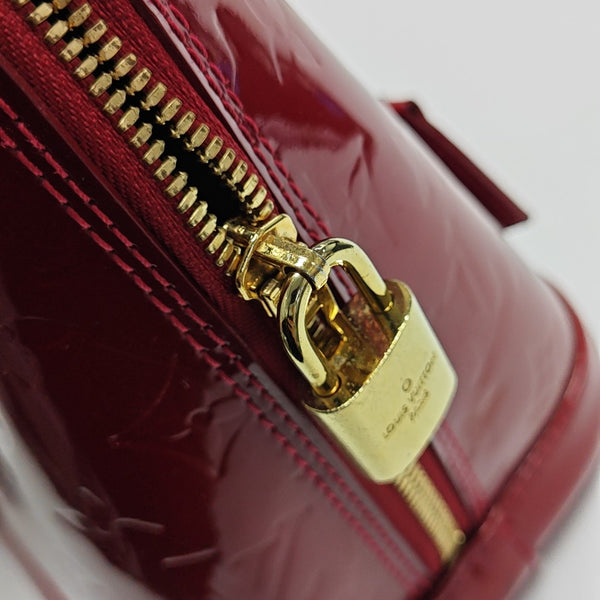 ALMA PM Monogram Patent Leather Red