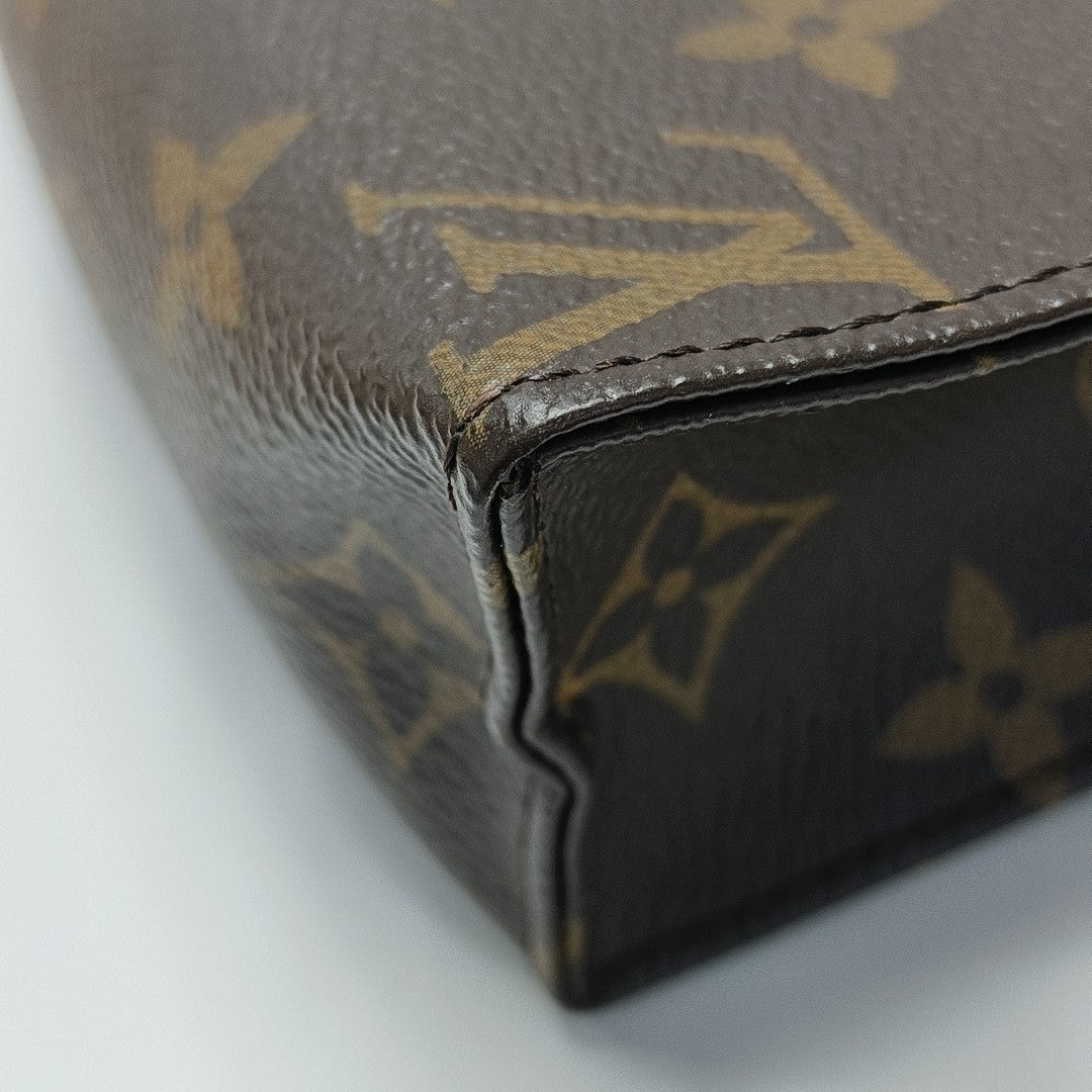 TOILET POCKET 19 Monogram Coated Canvas Brown
