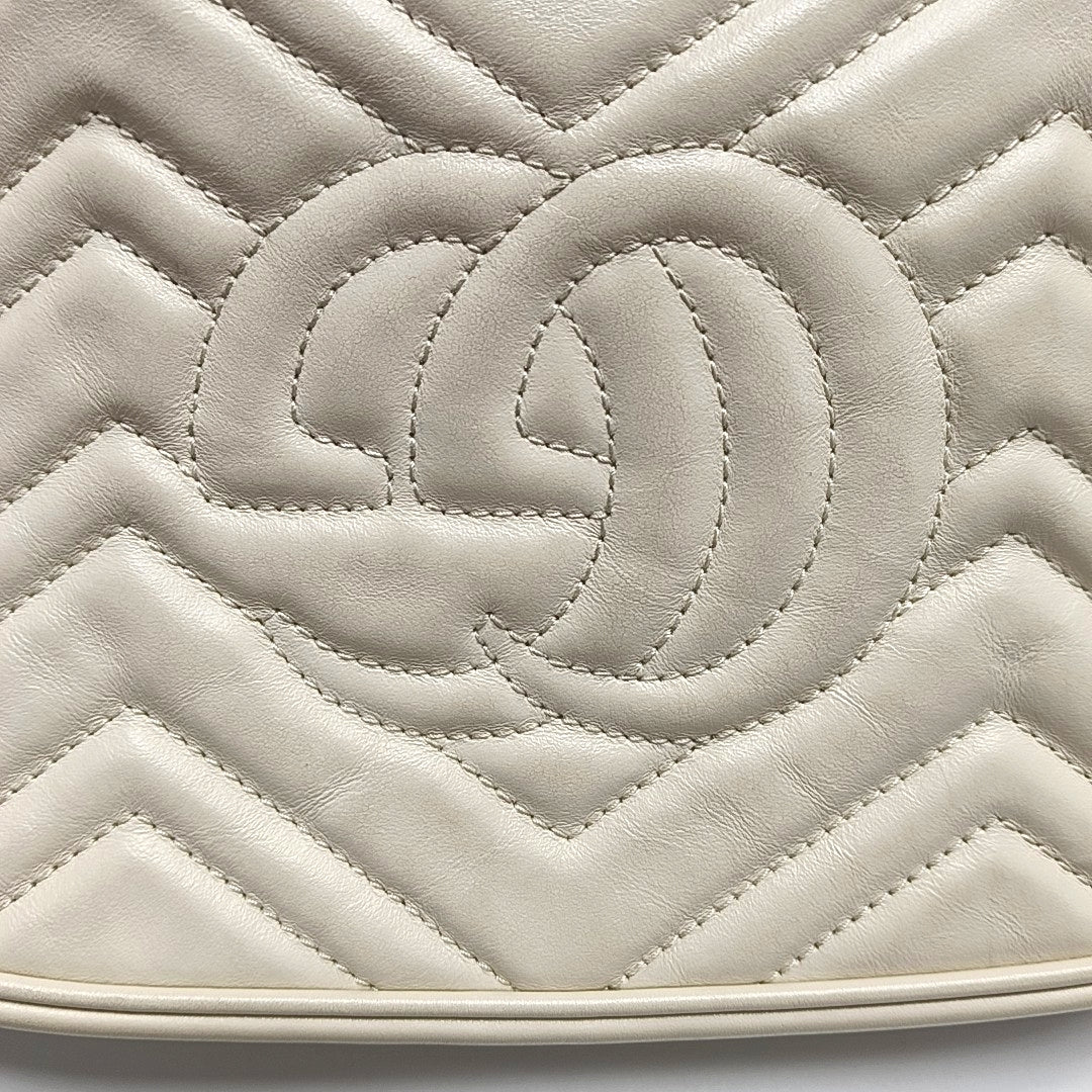 Authenticated pre-owned  GG Marmont Small Quilted Calfskin White - Crossbody Bag at Looply