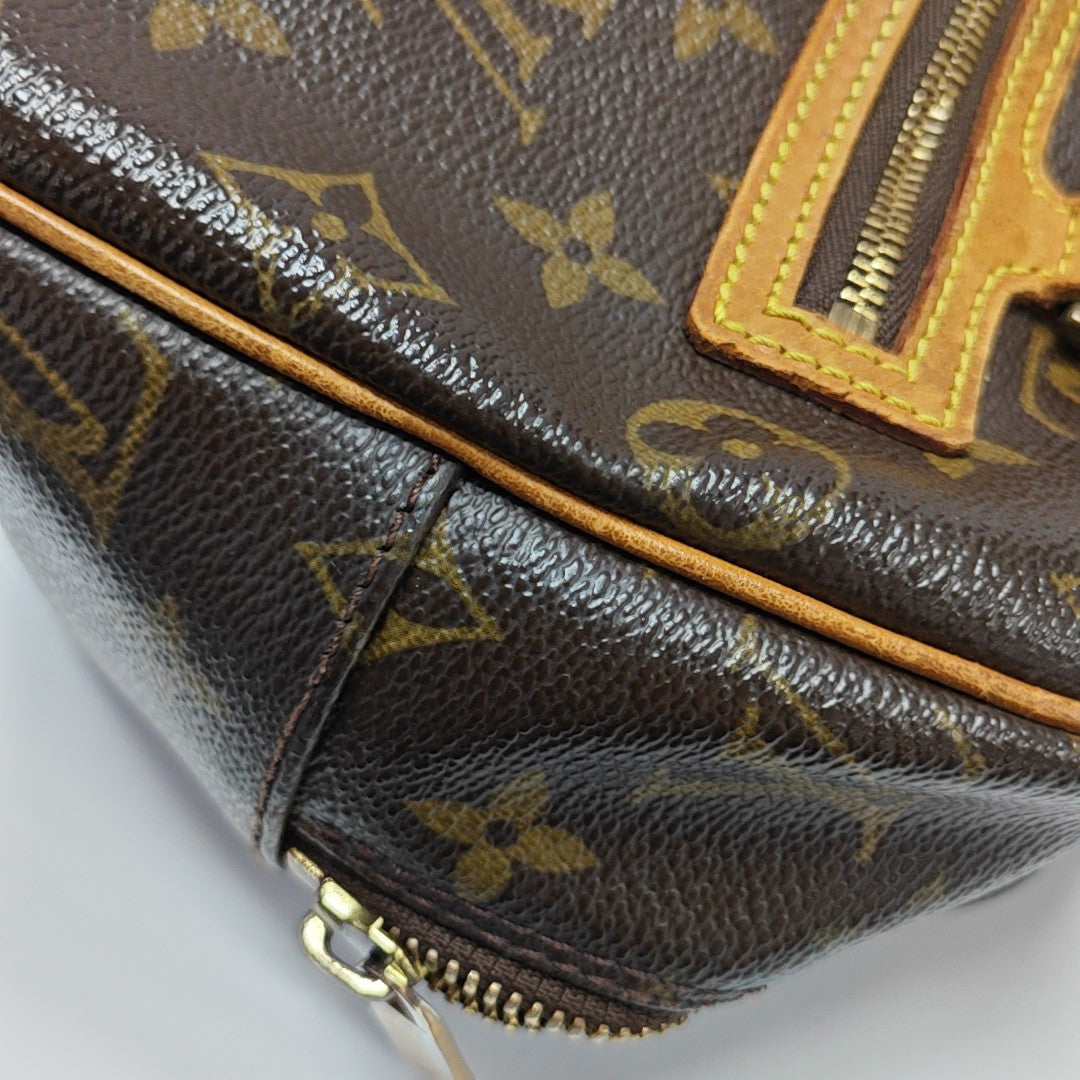 CITE Monogram Coated Canvas Brown