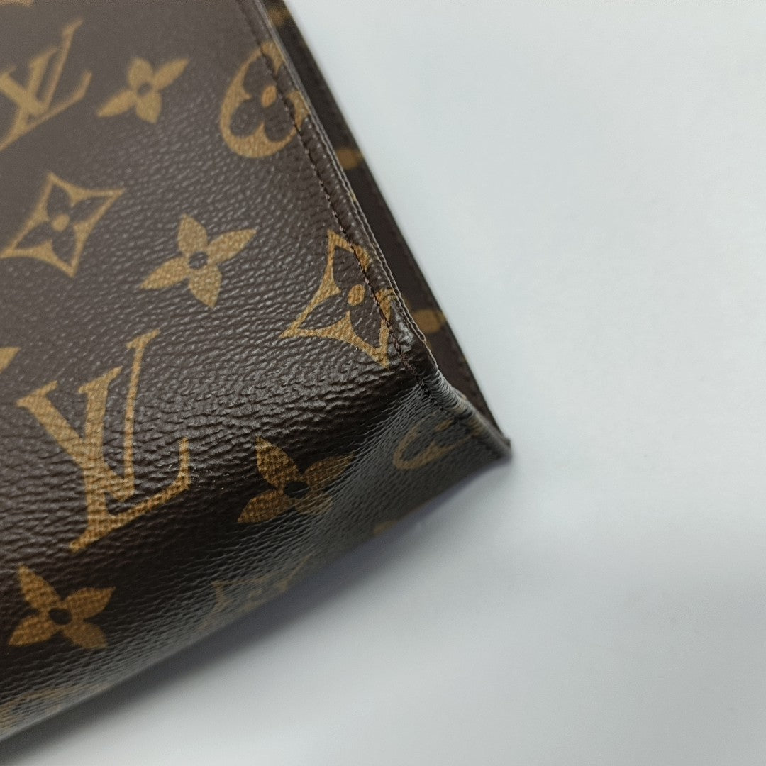 TOILET POCKET 26 Monogram Coated Canvas Brown