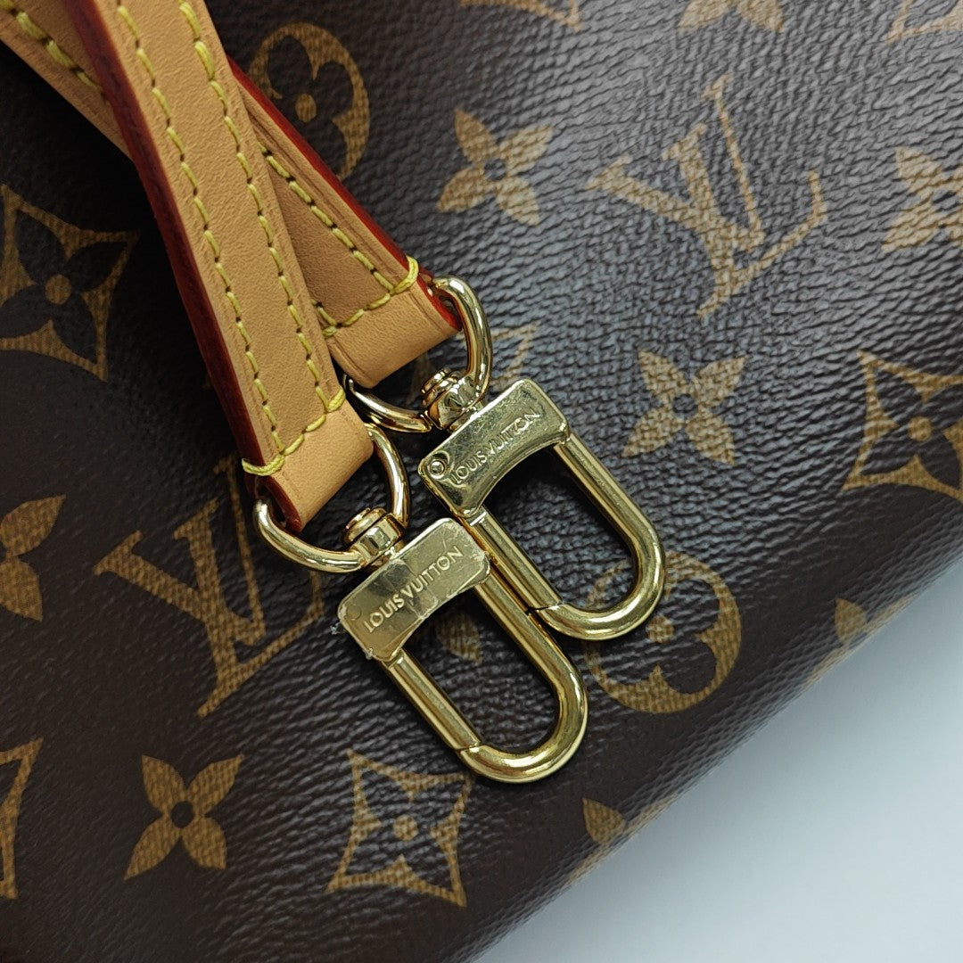SIDE TRUNK GM Monogram Coated Canvas Brown