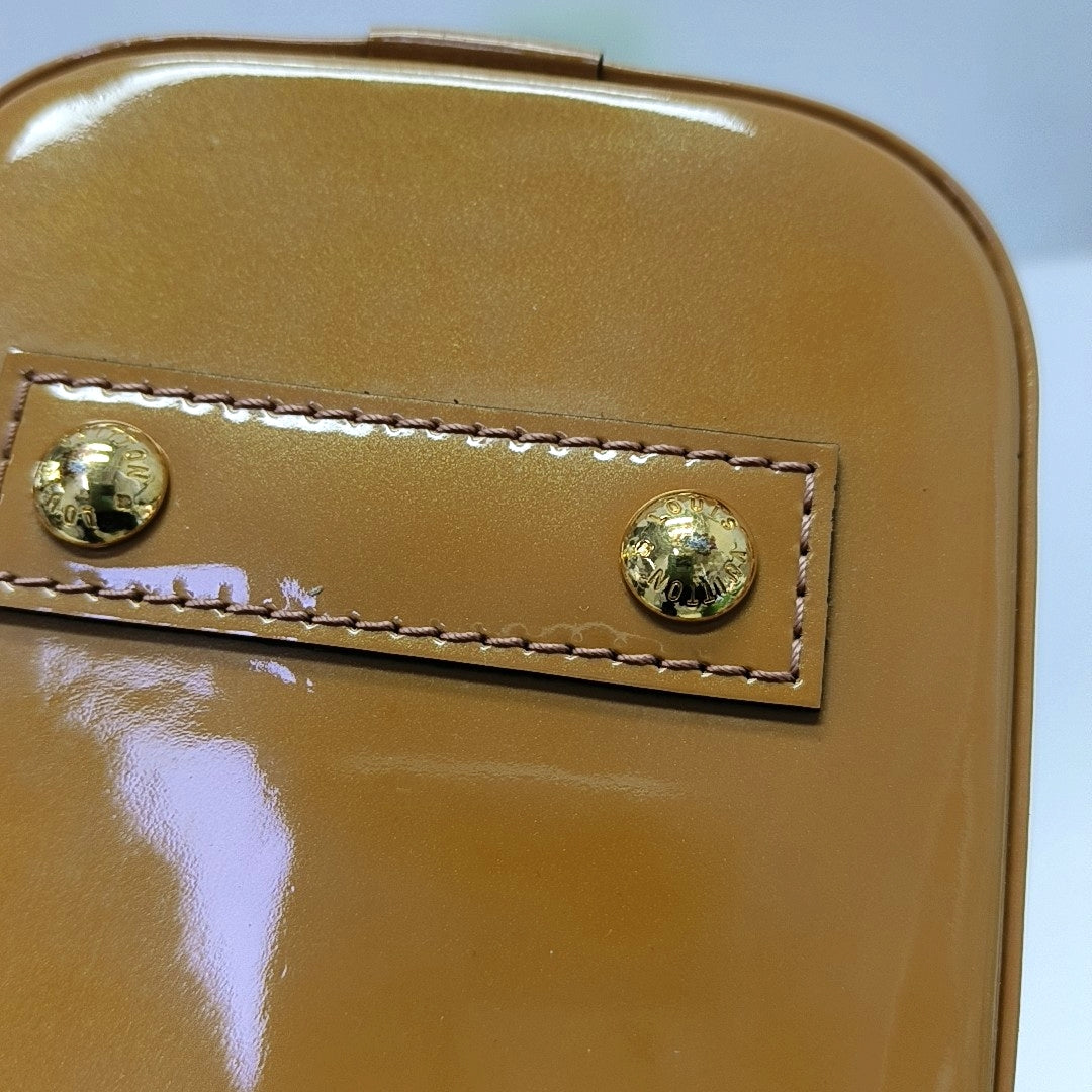 Authenticated pre-owned  ALMA Monogram Patent Leather Yellow - Shoulder Bag at Looply
