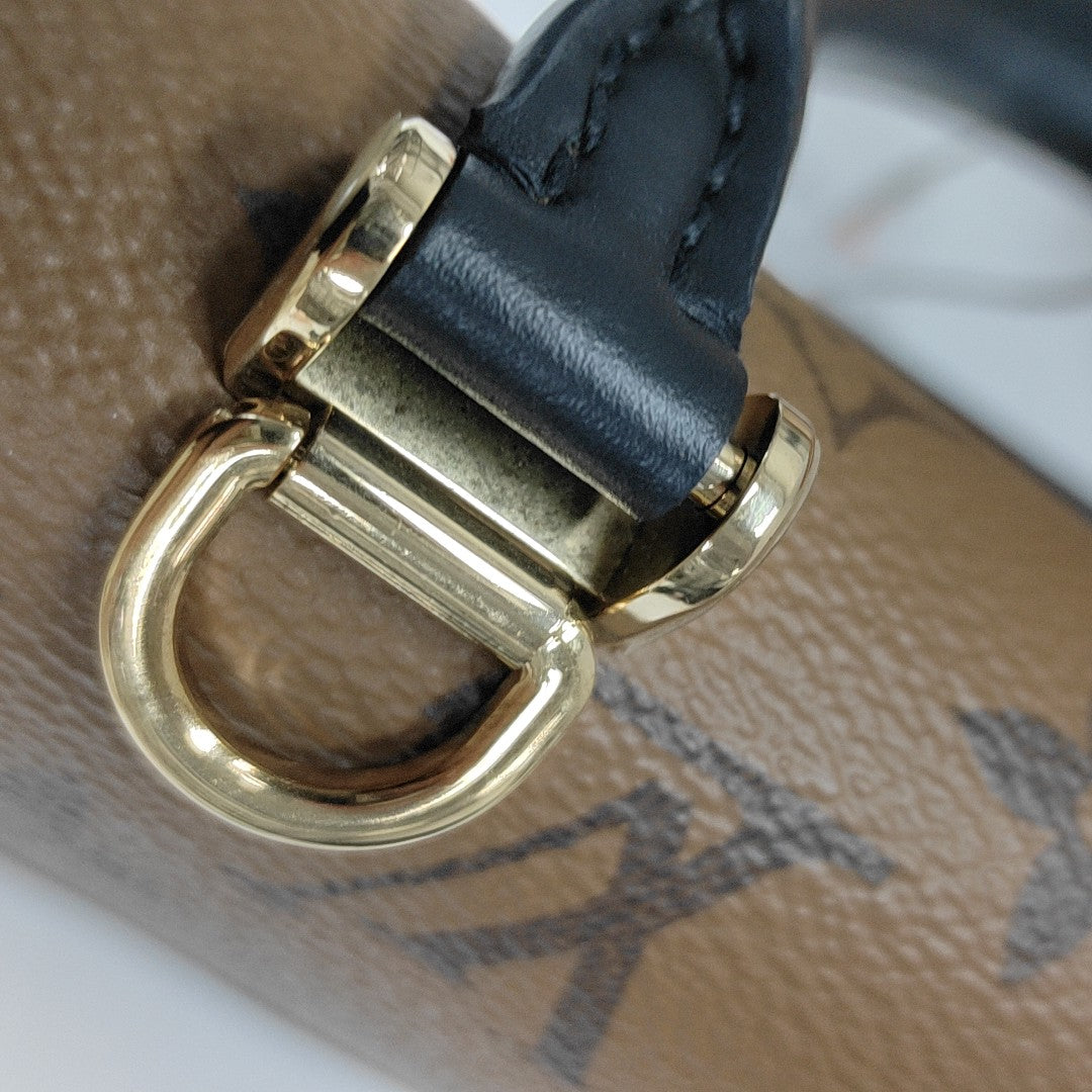 EDEN Monogram Coated Canvas Brown