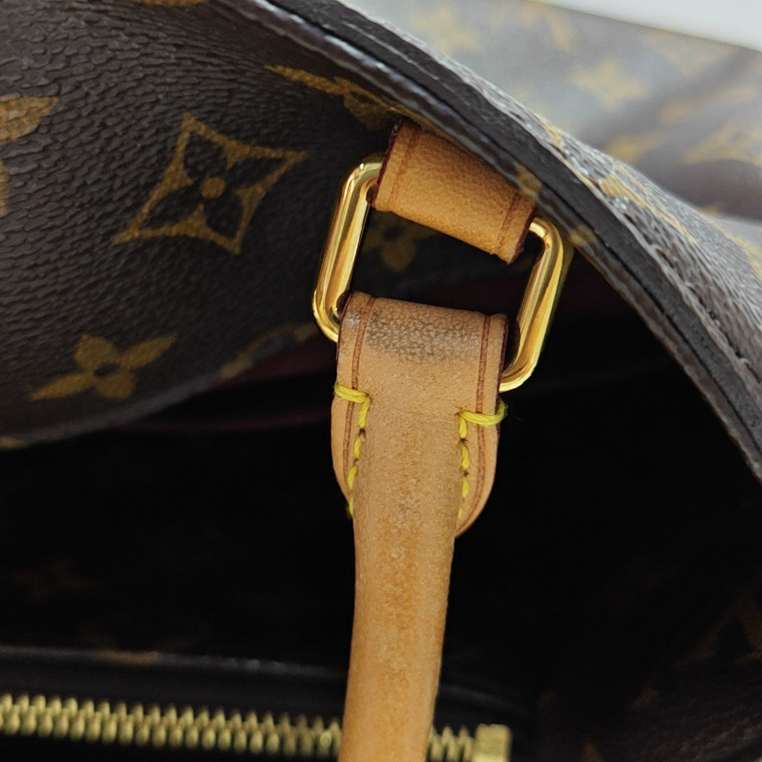 MONTAIGNE GM Monogram Coated Canvas Brown