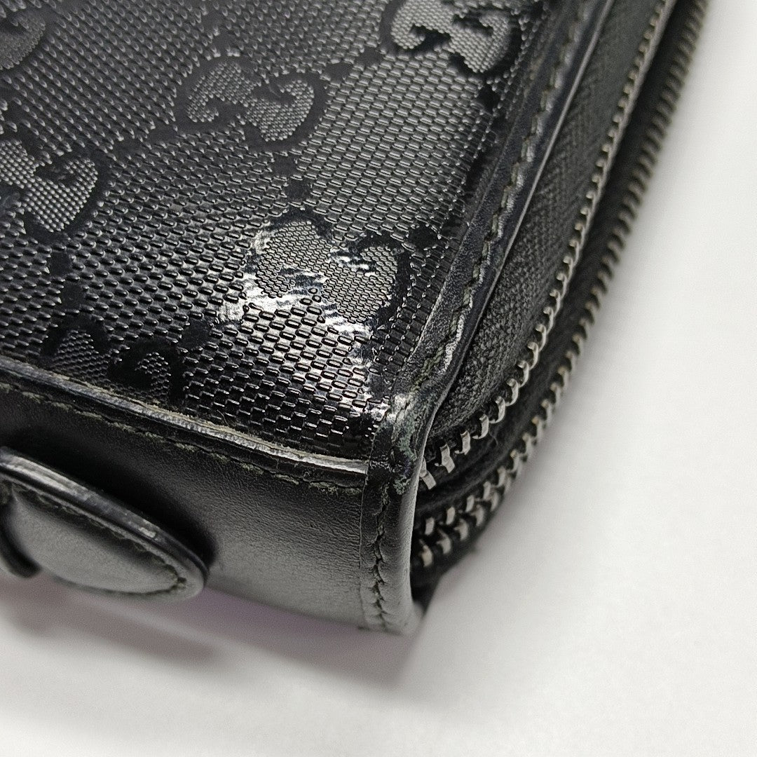 Monogram Coated Canvas Clutch Black