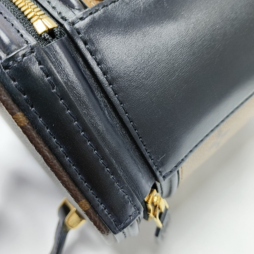 CANNES PM Monogram Coated Canvas Brown