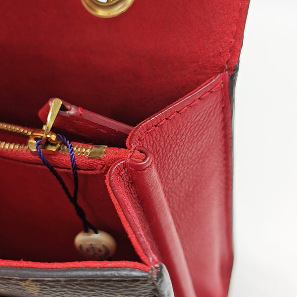 VICTOIRE Monogram Coated Canvas Brown