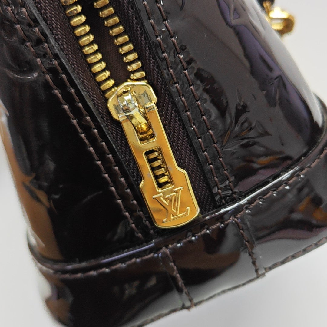 ALMA BB Monogram Patent Leather Brown