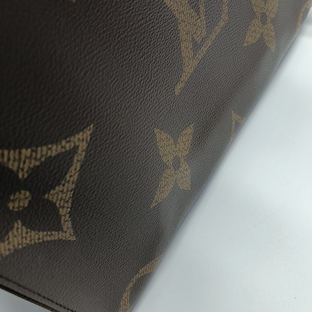 ONTHEGO MM Monogram Coated Canvas Brown