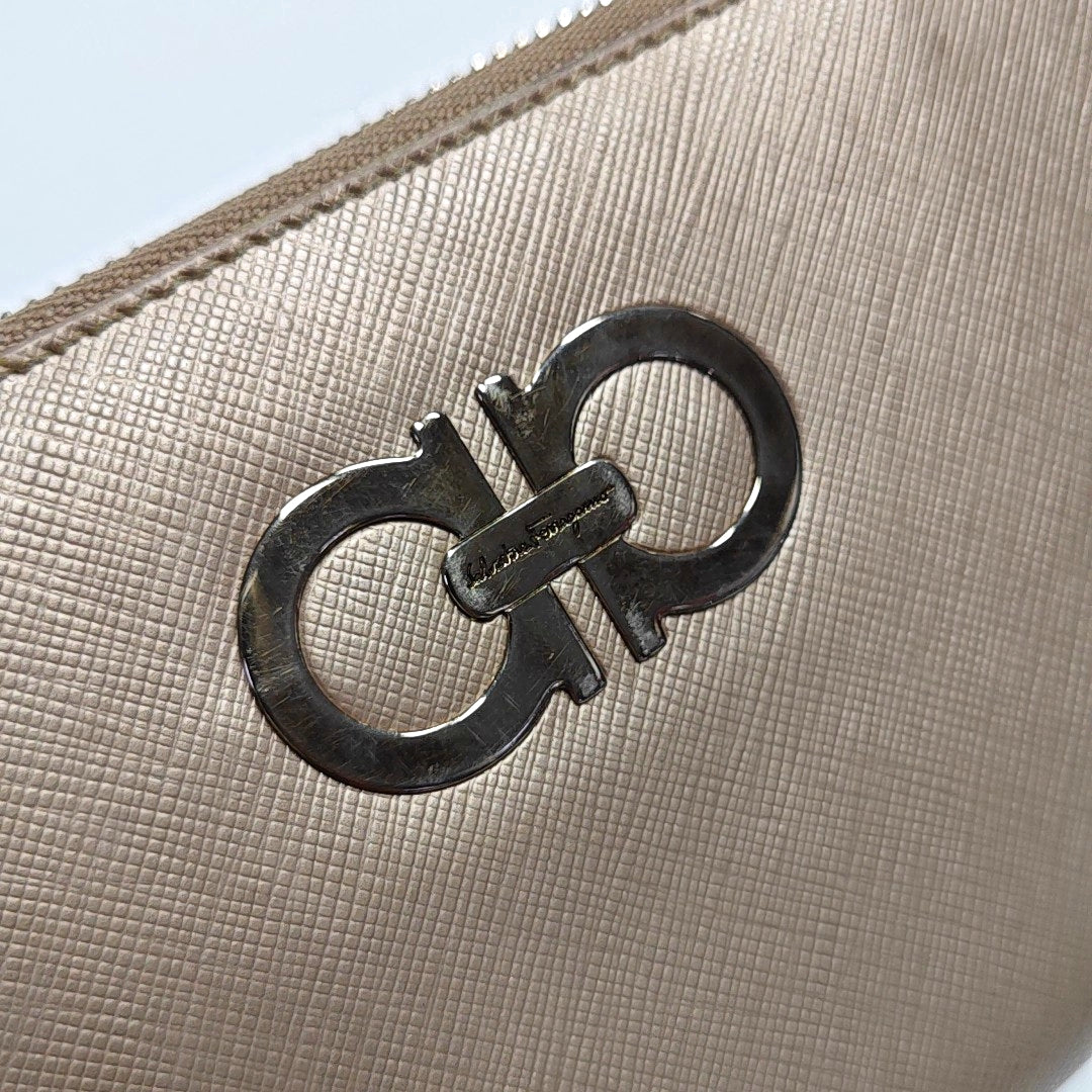 Authenticated pre-owned  Gancini Calfskin Beige Wallet - Wallet at Looply