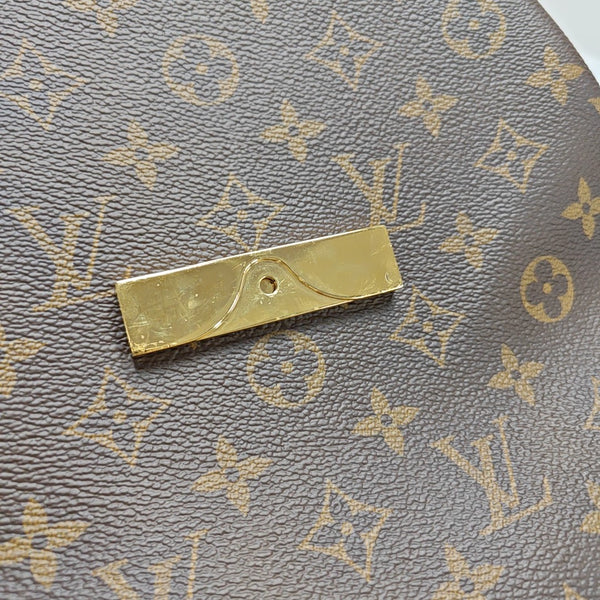 Monogram Coated Canvas PM Brown