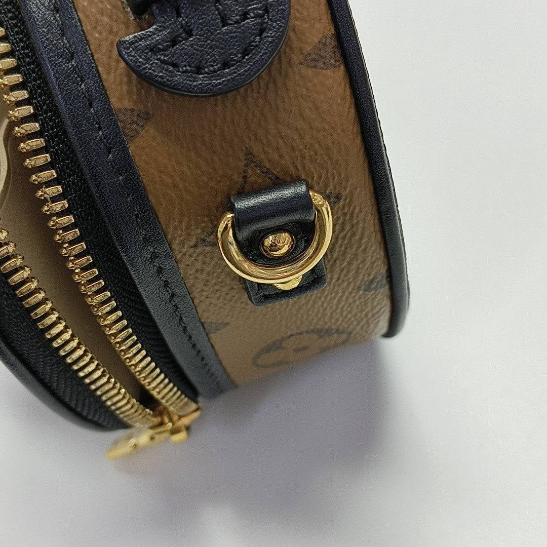 BOITE CHAPEAU Mini Monogram Coated Canvas Brown