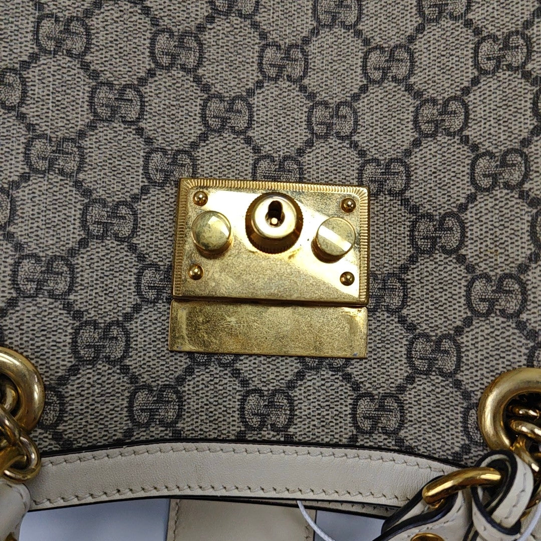 Padlock Small Monogram Coated Canvas Beige