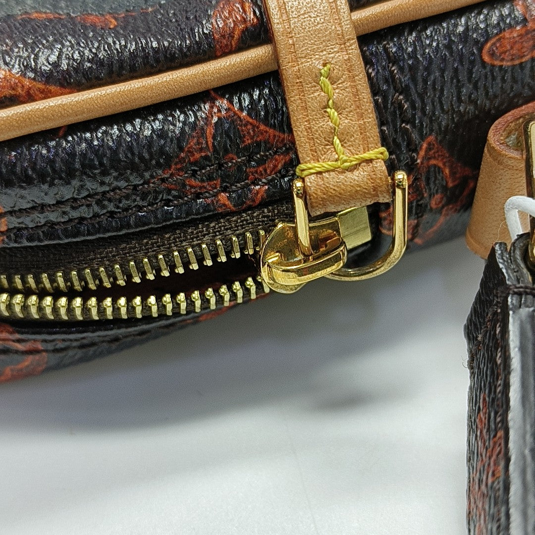 DANUBE Monogram Coated Canvas Brown