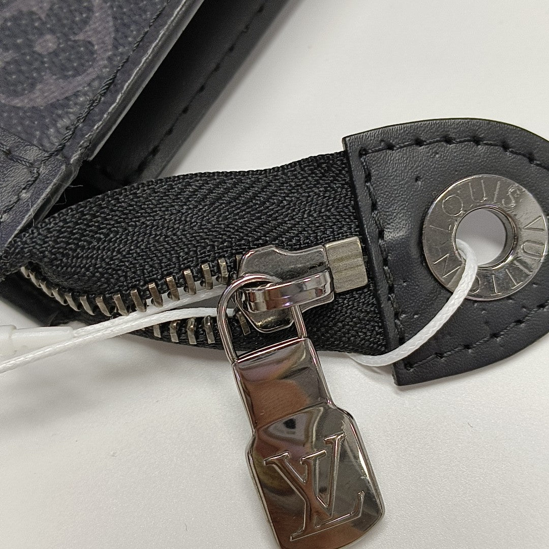 Pochette Voyag MM Monogram Coated Canvas Black